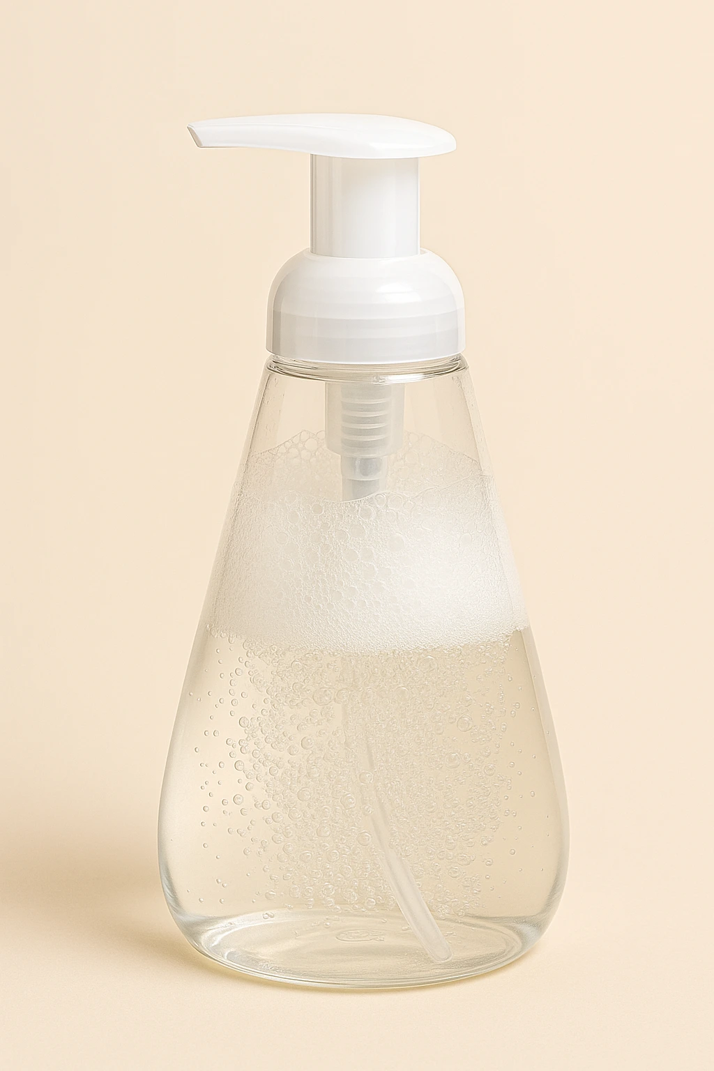 Foaming hand soap in a clear pump bottle showing bubble structure